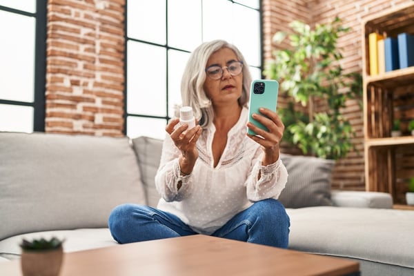 female patient using medication technology at home