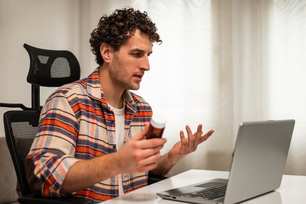 patient asking questions to a remove pharmacist