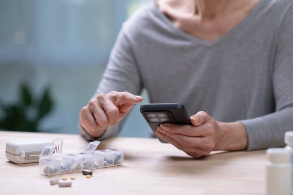 patient reviewing medication reminder