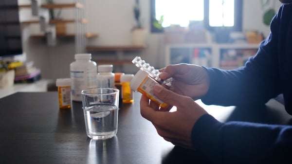 patient reviewing the medications in their daily regiment