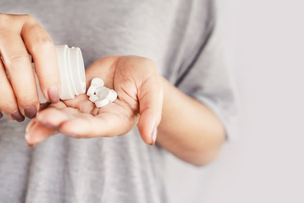 patient taking statin medication for effective management