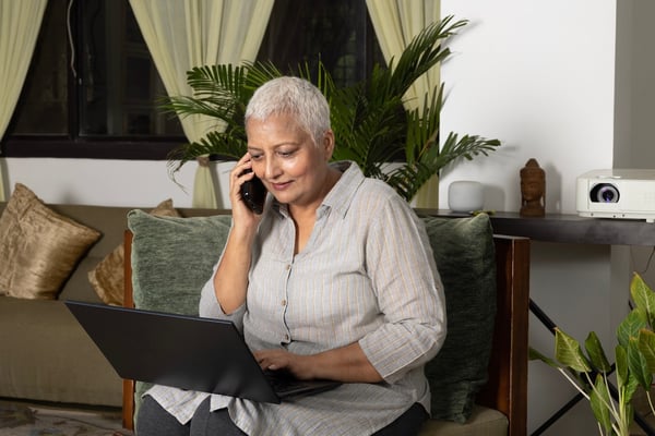 pharmacist addressing healthcare risk on phone with patient