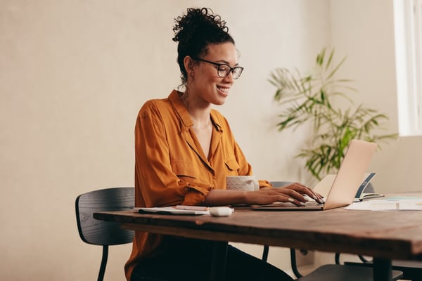 remote pharmacist working from laptop
