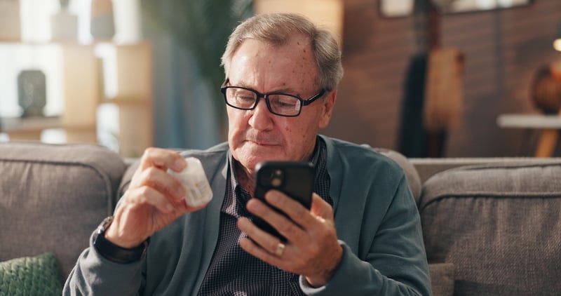 senior using outsourced pharmacy services for medication management at home
